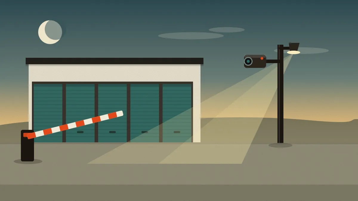 Flat illustration of a storage building at dusk with five teal doors, a tall pole carrying a camera and a floodlight whose light falls across the doors, a striped barrier arm beside it and a half moon in the sky
